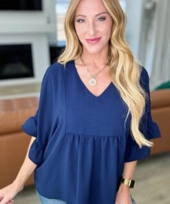Airflow Peplum Ruffle Sleeve Top in Navy - Fashion Are Us, LLC